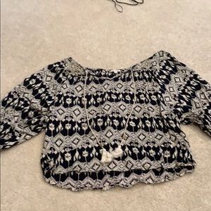 Blue and cream blouse with tassles